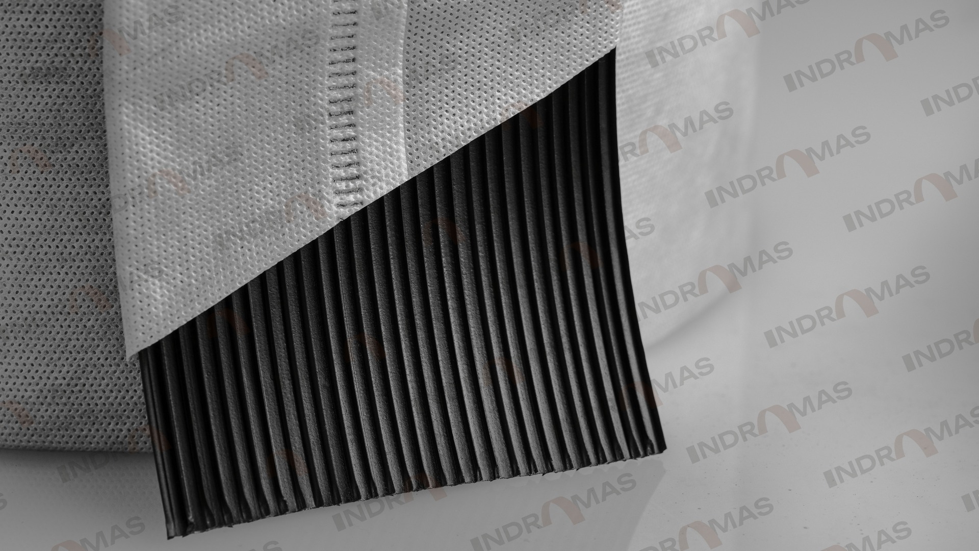 Close-up of a T-Drain prefabricated vertical drain with its filter jacket